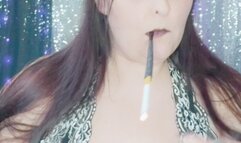 Nicki Pie smokes with cigarette holder plays with her tits