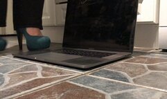 Cigarette and muffin crush on mac book pro with heels