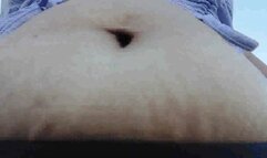 pretty in purple under Latina milf Giantess Bouncy bloated Belly Bouncy as she walks while occasionally fingering her BellyButton in a crop top avi