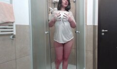 Taking a shower wearing white T-shirt and white full back panties