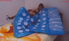 Alla inflates a large transparent air mattress with her mouth!!!