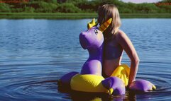 Alla is hotly rubbing herself on an inflatable magic dragon in the lake!!!