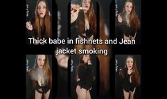 Thick babe in fishnets and jean jacket smoking