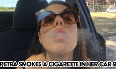 Petra smokes a cigarette in her car 2 - FULL HD