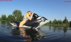 Alla has a hot ride on a squeaky old inflatable whale on the lake and wears a rare inflatable vest!!!