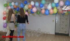 Two girls play with balloons - Popping 1 (0134n)