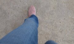 Fifi pedal pumping in pink flats and blue jeans