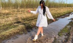 HIGH HEELS Christina walks through deep puddles in high heels