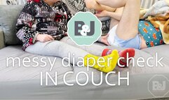 Messy diaper check in couch