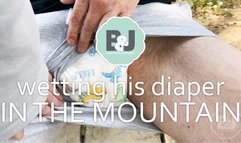 Wetting his diaper in the mountain