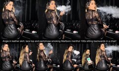 Angie in leather skirt, lace top and pantyhose smoking Marlboro menthol 100s sitting backwards in a chair!