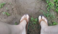 Playing in the mud in my Birkenstocks and Rainbows