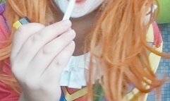 clowngirl poping balloons with cigarette