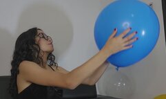 Marianna gives a pin kiss to all her balloons