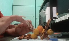 Eating fruit using long nails