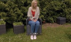 Aston Wilde wets her jeans in the garden