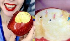 The giantess Snow White and the tiny dwarfs in the apple