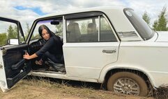 CAR STUCK Stuck in a puddle and pushing a stuck car in high heels