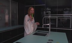 Very hot amateur uses a cucumber to masturbate in kitchen