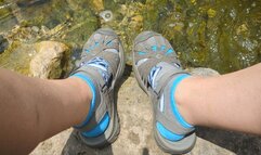 Fifi playing in the creek after yoga fully dressed in capri leggings and socks with sandals replay