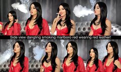 Side view dangling smoking Marlboro red wearing red leather outfit!