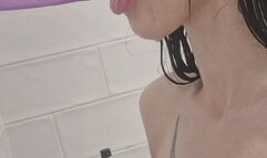 Gagging a dildo under the shower