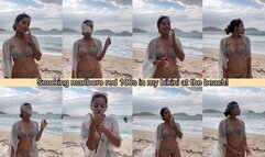 Angie smoking marlboro red 100s in bikini at the beach!