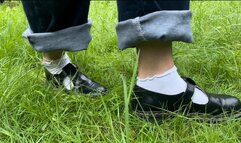 Naughty Amellie gets her feet and socks dirty while walking on the grass