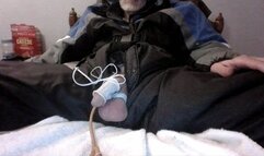 Enjoying some estim play with a Foley catheter and anal play