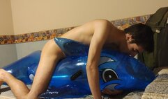 Blowing up and riding my inflatable whale until cum