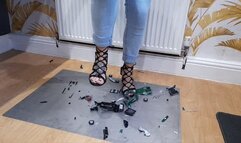 Giantess Atari queen destroys a 1969 Camaro hand built toy car crush in sexy black strappy heels right side view