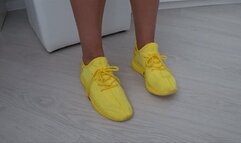 Wiggling my toes in my soft yellow sneakers aa