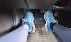 Car driving in nike sneakers