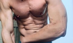 Up close flexing with ripped abs and bulging veins HD