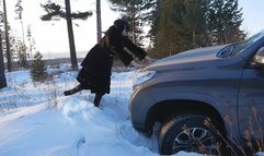 Long-legged hottie drives in the snow and gets her car stuck | Pedal pumping