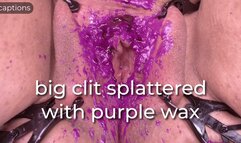 big clit splattered with purple wax - captioned