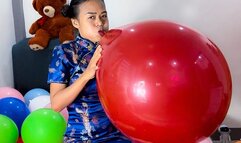 Sexy Camylle Blows To Pop 2 Huge Balloons Dressed In A Traditional Asian Dress