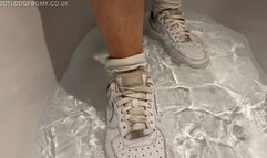 Getting my white socks and Nike sneakers soaking wet in the bath