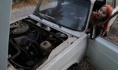 Anya is having a good time cranking the starter, she's never seen old wrecks like this before