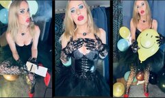 The sexy chain smoking witch is smoking a black sobranie while destroying some balloons