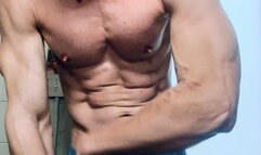 Up close flexing with ripped abs and bulging veins SD