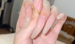 #80 - Fiddling ring with long natural nails