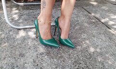 Beautiful stiletto heels dangle from a lady's feet (3)