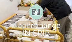 Diaper change in crib