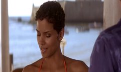 Halle Berry walking on the beach in sexy bikini