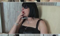 Mistress smokes and plays with a cigarette for you!