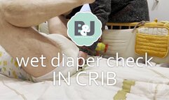 Wet diaper check in crib