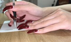 #104 - Writing with long red nails