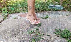 Scratching my feet while cleaning my backyard in high heels (3)