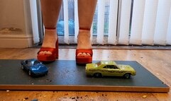 Giantess Lou crushes a Corvette and Chevy Impala in big red chunky heels ground view